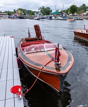 Varnished runabout with red upholstery