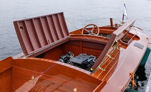 Mahogany runabout with the engine hatch open