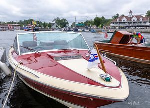 Red and white classic runabout