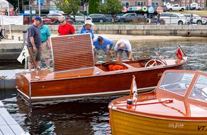 Mahogany boats along the show docks
