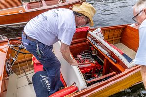 Owner showing his boat's engine