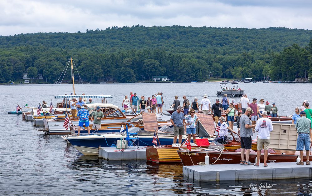 Visitors and owners crowd the Naples Town Docks among the classic boats at the 2026 show